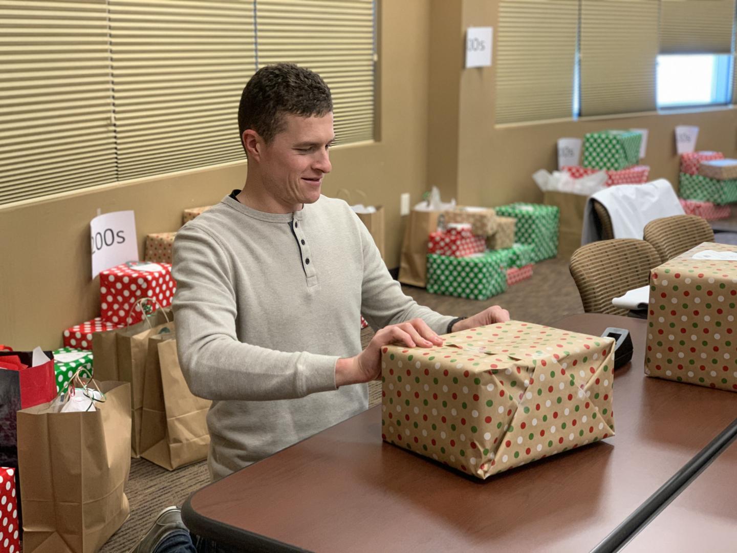 CCEC Employee wrapping presents